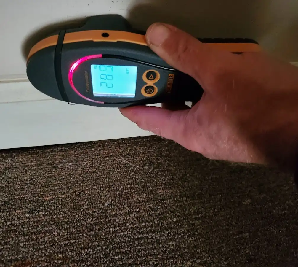 Moisture detection at baseboard during Storm Damage Restoration in Lebanon